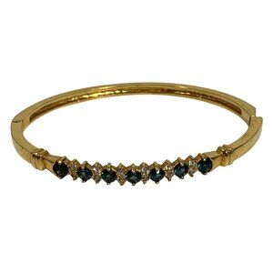 Elegant Gold-Plated Hinged Bangle Bracelet With Blue + Clear Gemstones